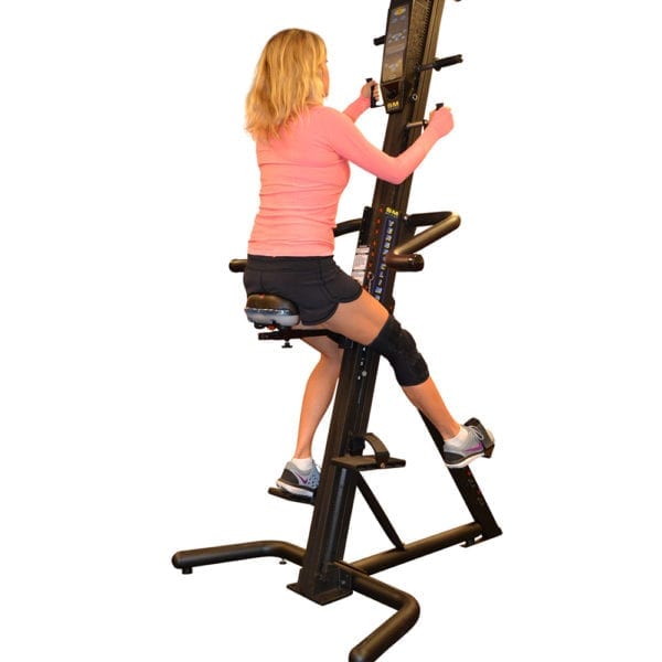 Woman using the VersaClimber Adjustable Seat Accessory