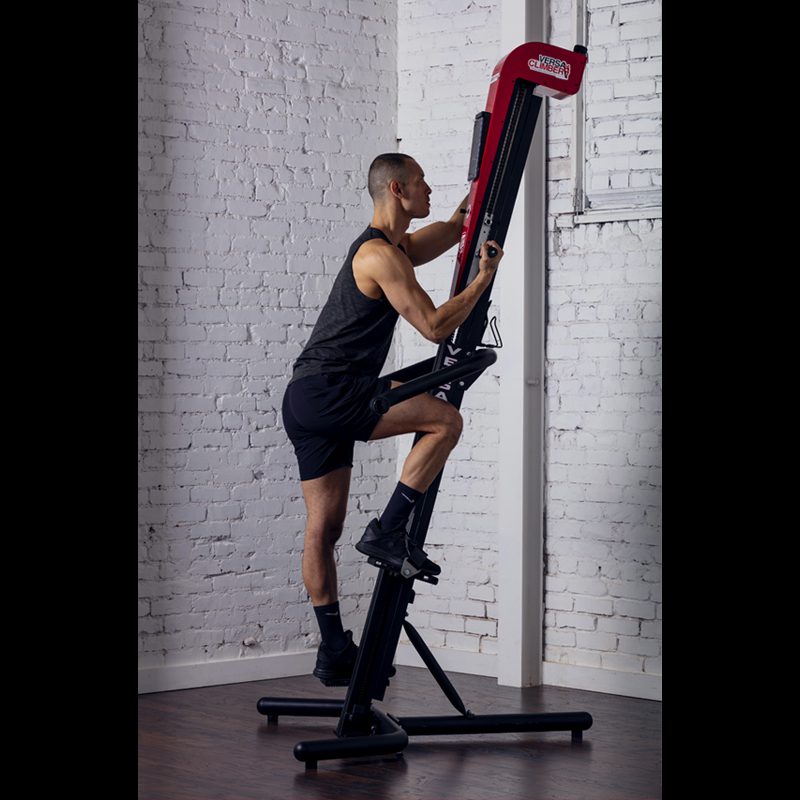 Man on VersaClimber doing Body Cardio